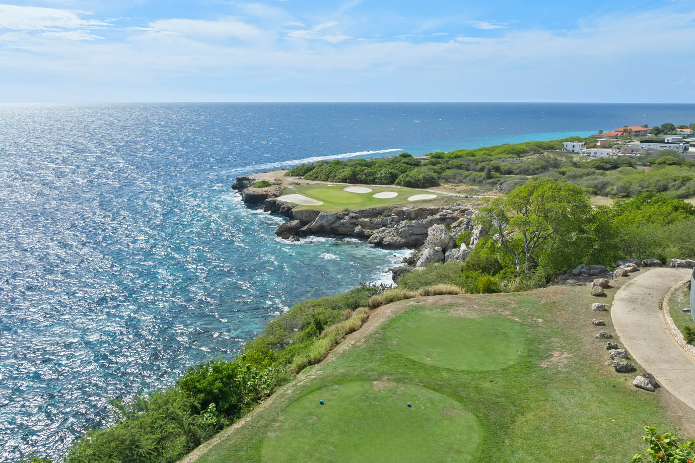 Blue Bay Curacao Golf Course besides the ocean